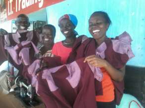Women Showing The Uniforms They Made