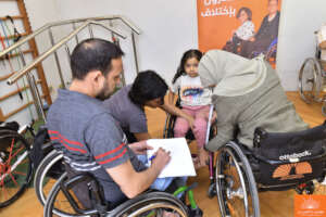 Taking wheelchair measurements for a girl