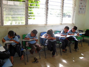 Chiapas participants completing evaluation forms