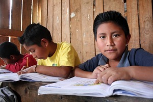 A program participant, working hard at school
