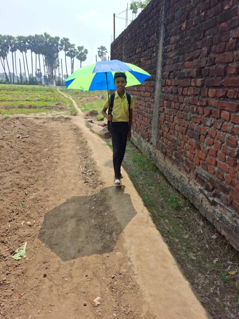 providing umbrella for children on this summer