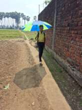 attending school with umbrella