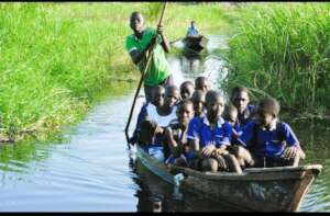 school children going to school using boat