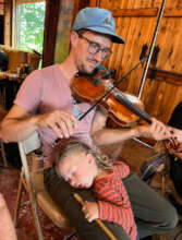 Falling asleep while daddy plays tunes!