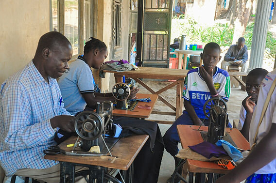 Train idle youth in tailoring