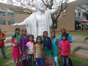 Near statute of a scientist
