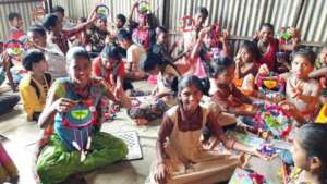 Coulourful wall hangings made by children