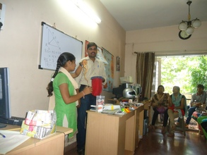 Magician teaching his tricks