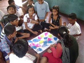 Youth group member teaching Paper craft