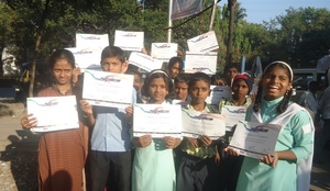 Proudly showing their certificates