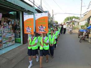 Students practicing safe pedestrian behavior