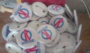Hand made pins for the conference