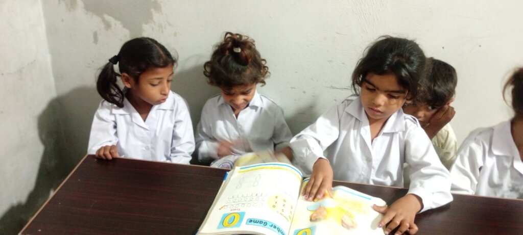 Need Paint and Benches for school children.