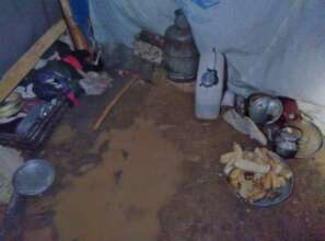 Displaced family flooded kitchen