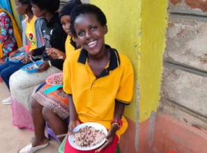 Student enjoying her lunch at Kitui