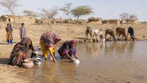 Women collecting water from unsafe source