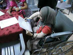 Woman Receiving Care at the Al Tadamoon Centre