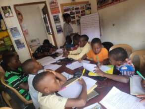 Community children at the center training I.C.T