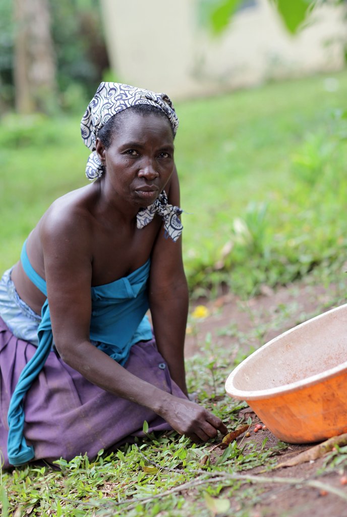 Teddy Namagembe, a Ugandan coffee farmer client.