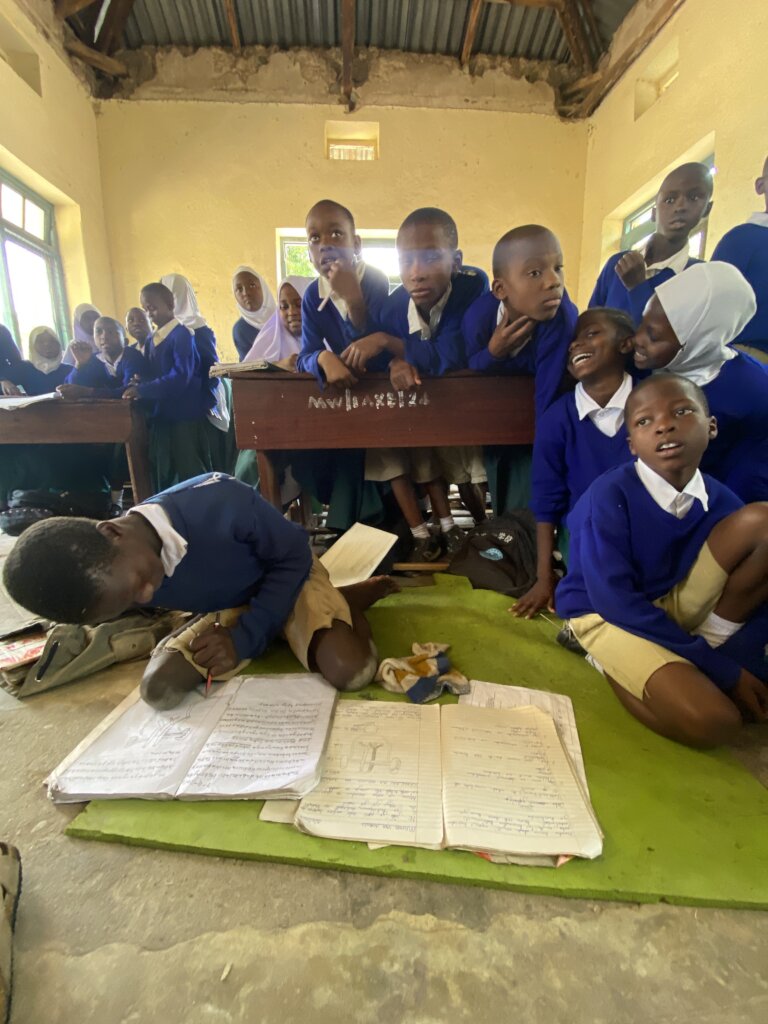 Idi attending school
