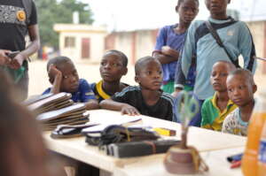Children learning shoe making
