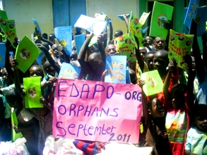 orphans receving reading- text books