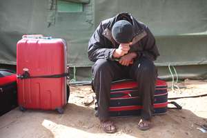 Refugee fleeing Libya in Ra's Ajdir, Tunisia.