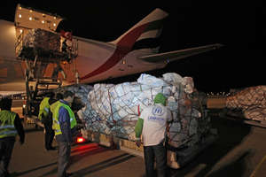 Tents arrive via a UN flight into Tunisia.