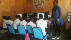 Abigael teaching other girls