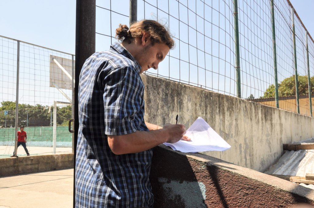 A WASH team member conducts monitoring exercises