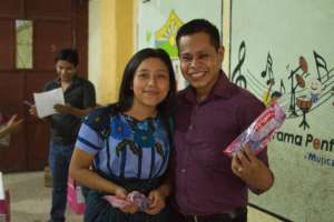 Teachers receiving Colgate supplies
