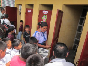 The school principal opening up the new facilities