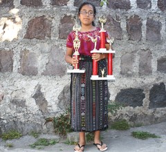 Josefa with her chess trophies