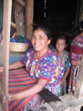 Vicenta is always happy when she is weaving.