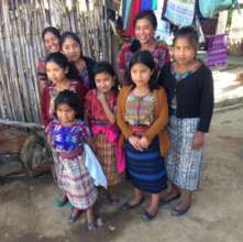 Scholarship recipients pose with their tutor