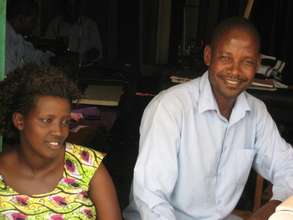 Faith and Frank in their tailoring shop