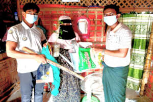 The REAL team distribute seeds and materials
