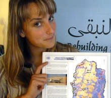 Morgan holding a map of West Bank Areas A, B, & C