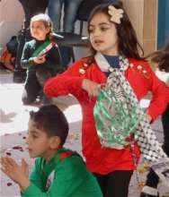 Al Aqaba's Kindergarteners performing on Land Day