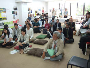 People gather at a community space.