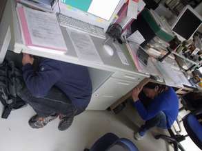 Seeking protection during earthquake simulation