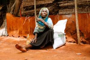 Elderly mom recieves rice support for her children