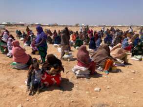 Women receiving food assistance in an IDP camp