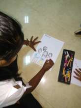 Children drawing their Ideal Family