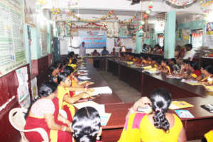 Workers in Rapt Attention at an Awareness Workshop