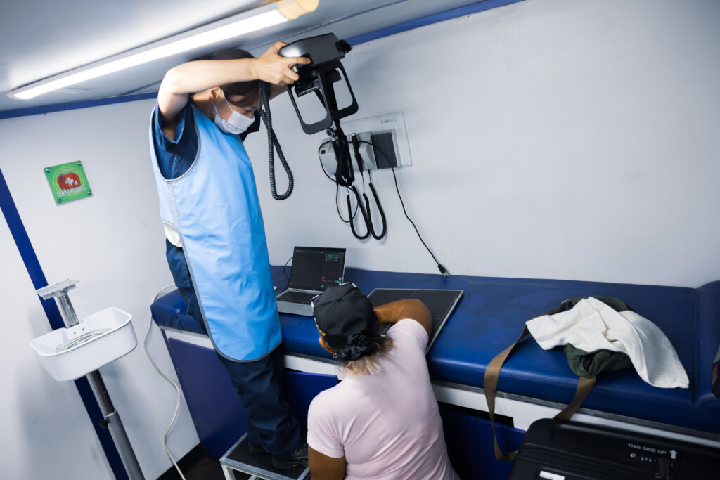 Team member uses Peace Winds' mobile X-ray