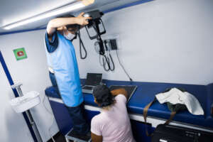 Team member uses Peace Winds' mobile X-ray
