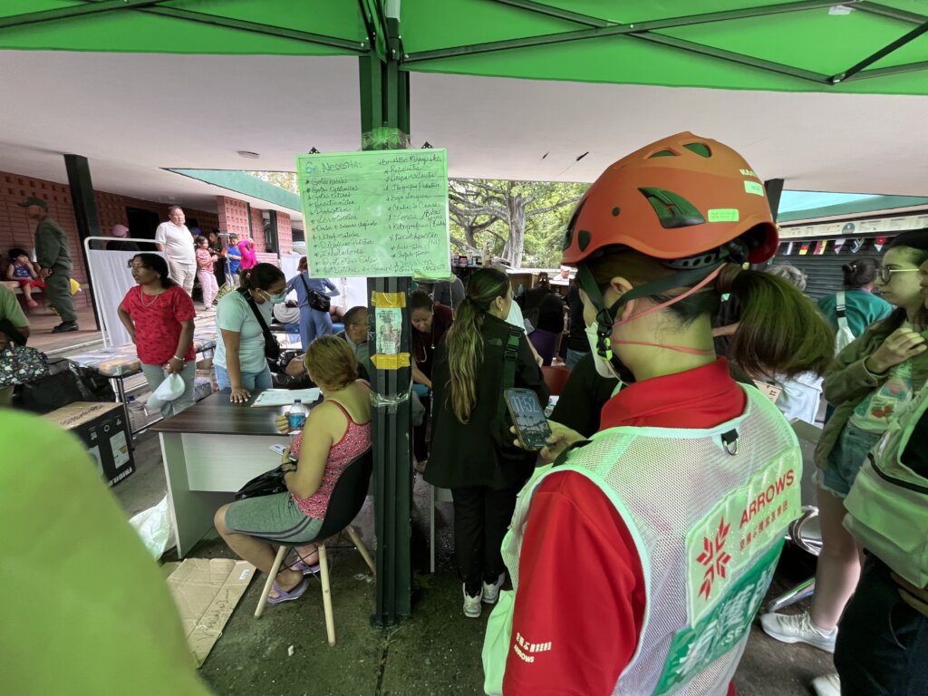 Patients await treatment at a makeshift clinic