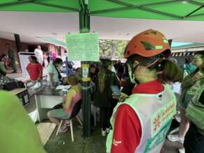 Patients await treatment at a makeshift clinic