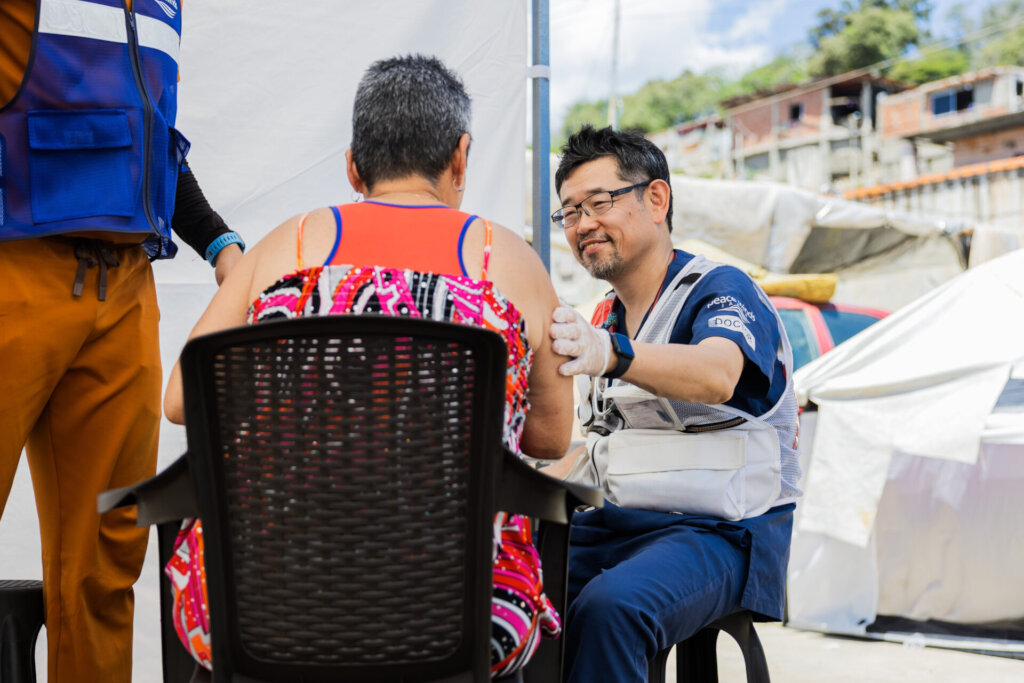 Dr. Inaba talks to a patient